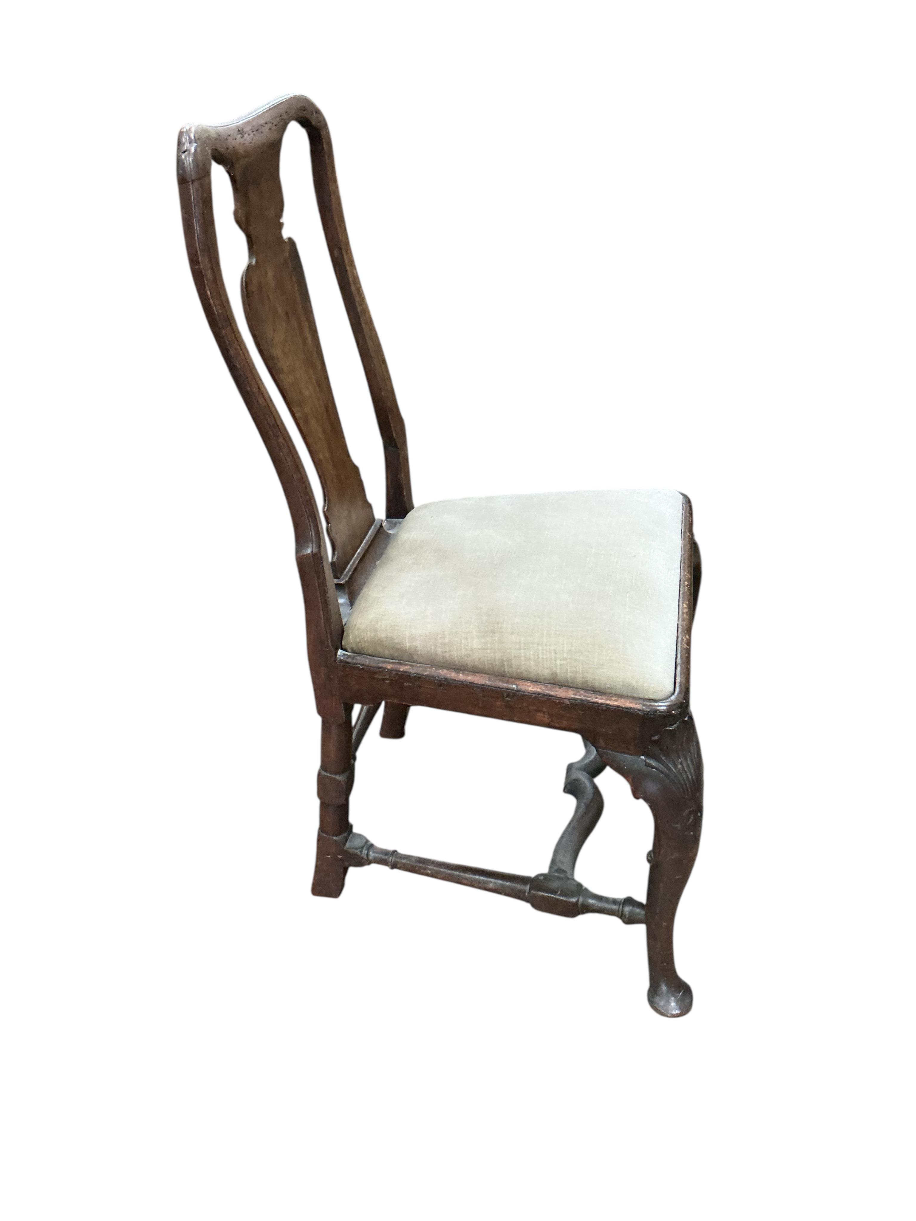 A pair of George I walnut dining chairs, width 54cm, depth 41cm, height 92cm